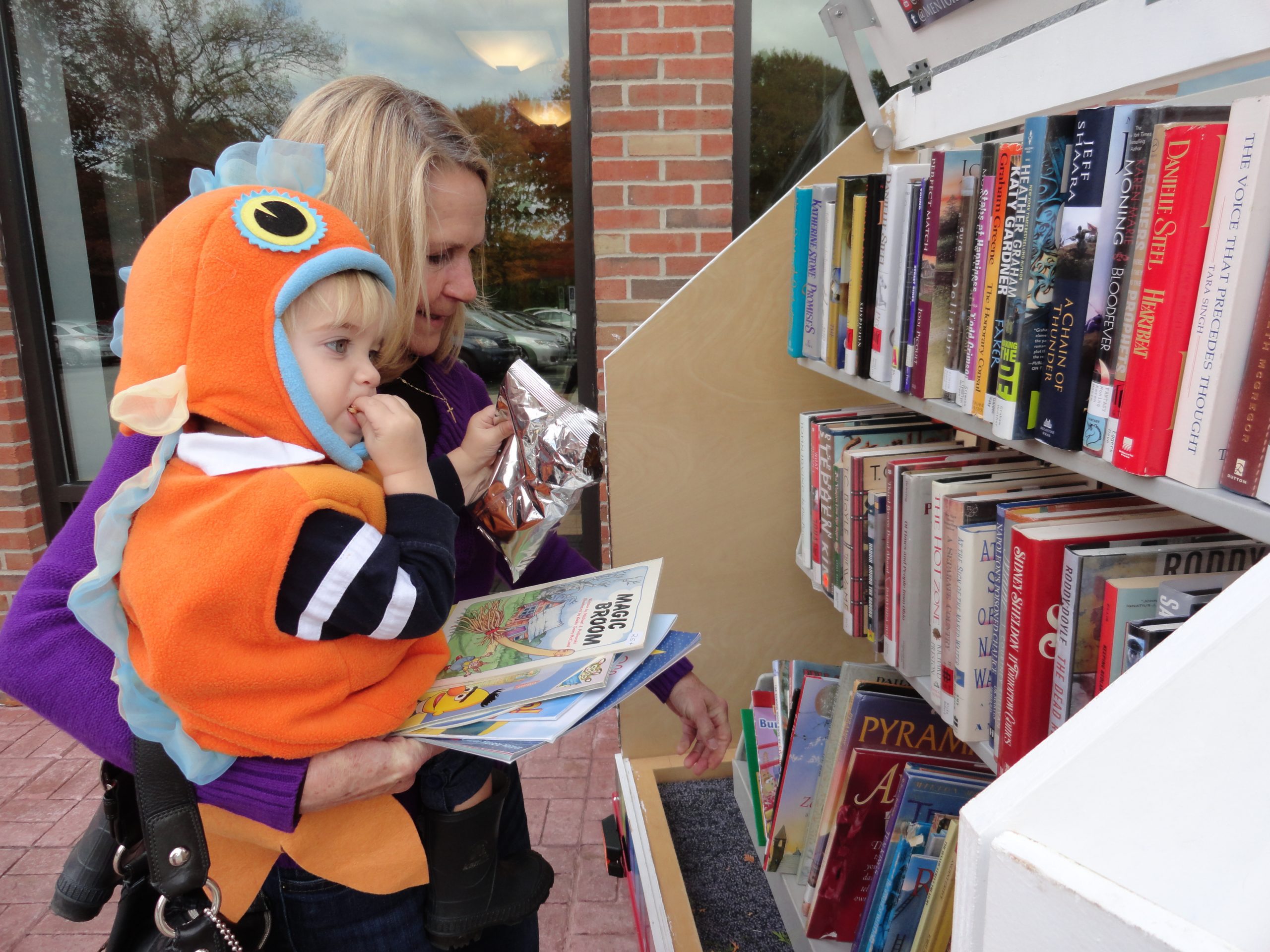 We set up the Pop-Up Library on Halloween, so costumed children could leave with more than candy.