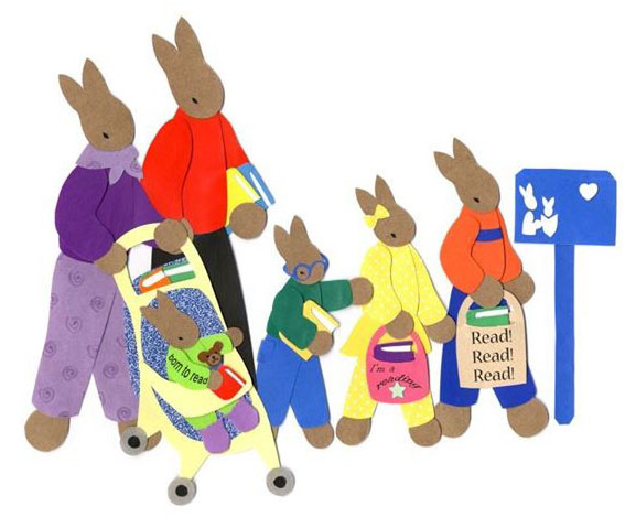 A family of bunnies makes their way to the library holding bags of books